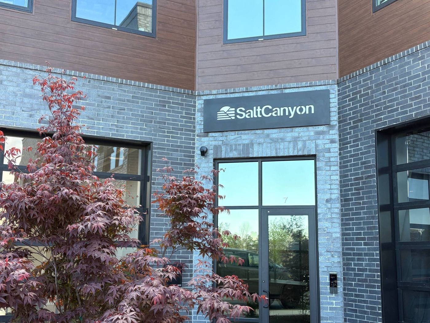 SaltCanyon sign above the entrance to our Draper office