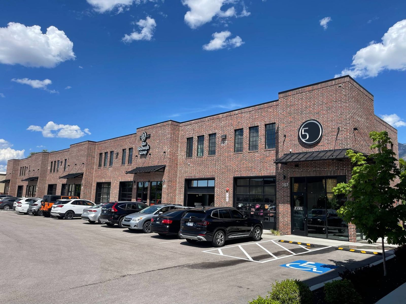 Draper Cove: red brick two-story flex buildings with storefronts